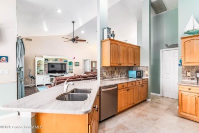 Lakefront Dream Home with Stunning Views & Thoughtful Upgrades on Baytree National Golf Links in Florida - for sale on GolfHomes.com, golf home, golf lot