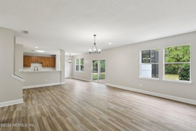 Welcome to this inviting home in Chatham Village at Fleming on Golf Club At Fleming Island in Florida - for sale on GolfHomes.com, golf home, golf lot