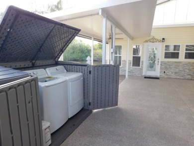 Wonderful Executive Suite with kitchen and bathroom. Washer on The Great Outdoors Golf and Country Club in Florida - for sale on GolfHomes.com, golf home, golf lot