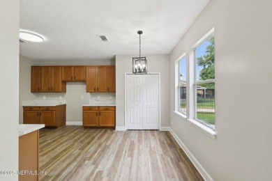 Welcome to this inviting home in Chatham Village at Fleming on Golf Club At Fleming Island in Florida - for sale on GolfHomes.com, golf home, golf lot