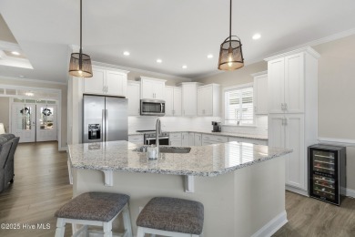 Welcome to this 4 bedroom, 3 full bath Plum Island II townhome on Compass Pointe Golf Course in North Carolina - for sale on GolfHomes.com, golf home, golf lot