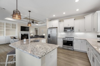 Welcome to this 4 bedroom, 3 full bath Plum Island II townhome on Compass Pointe Golf Course in North Carolina - for sale on GolfHomes.com, golf home, golf lot