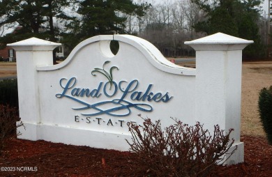 This .48 acre lot is located in the desirable Land O Lakes on Land-O-Lakes Golf Course in North Carolina - for sale on GolfHomes.com, golf home, golf lot