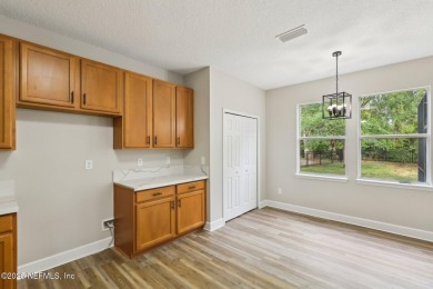Welcome to this inviting home in Chatham Village at Fleming on Golf Club At Fleming Island in Florida - for sale on GolfHomes.com, golf home, golf lot