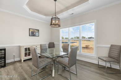 Welcome to this 4 bedroom, 3 full bath Plum Island II townhome on Compass Pointe Golf Course in North Carolina - for sale on GolfHomes.com, golf home, golf lot