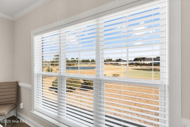 Welcome to this 4 bedroom, 3 full bath Plum Island II townhome on Compass Pointe Golf Course in North Carolina - for sale on GolfHomes.com, golf home, golf lot
