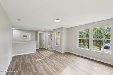 Welcome to this inviting home in Chatham Village at Fleming on Golf Club At Fleming Island in Florida - for sale on GolfHomes.com, golf home, golf lot