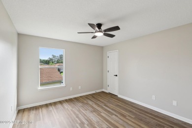 Welcome to this inviting home in Chatham Village at Fleming on Golf Club At Fleming Island in Florida - for sale on GolfHomes.com, golf home, golf lot