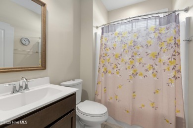 Welcome to this 4 bedroom, 3 full bath Plum Island II townhome on Compass Pointe Golf Course in North Carolina - for sale on GolfHomes.com, golf home, golf lot