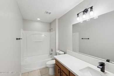 Welcome to this inviting home in Chatham Village at Fleming on Golf Club At Fleming Island in Florida - for sale on GolfHomes.com, golf home, golf lot