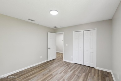 Welcome to this inviting home in Chatham Village at Fleming on Golf Club At Fleming Island in Florida - for sale on GolfHomes.com, golf home, golf lot