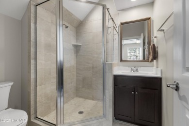 Welcome to this 4 bedroom, 3 full bath Plum Island II townhome on Compass Pointe Golf Course in North Carolina - for sale on GolfHomes.com, golf home, golf lot