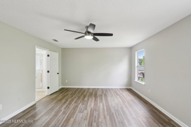 Welcome to this inviting home in Chatham Village at Fleming on Golf Club At Fleming Island in Florida - for sale on GolfHomes.com, golf home, golf lot