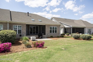 Welcome to this 4 bedroom, 3 full bath Plum Island II townhome on Compass Pointe Golf Course in North Carolina - for sale on GolfHomes.com, golf home, golf lot