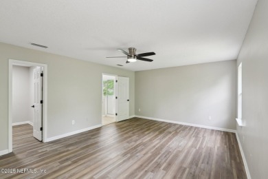 Welcome to this inviting home in Chatham Village at Fleming on Golf Club At Fleming Island in Florida - for sale on GolfHomes.com, golf home, golf lot