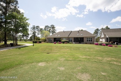 Welcome to this 4 bedroom, 3 full bath Plum Island II townhome on Compass Pointe Golf Course in North Carolina - for sale on GolfHomes.com, golf home, golf lot