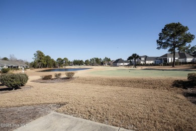 Welcome to this 4 bedroom, 3 full bath Plum Island II townhome on Compass Pointe Golf Course in North Carolina - for sale on GolfHomes.com, golf home, golf lot