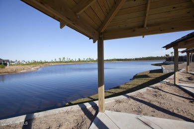 Welcome to this 4 bedroom, 3 full bath Plum Island II townhome on Compass Pointe Golf Course in North Carolina - for sale on GolfHomes.com, golf home, golf lot