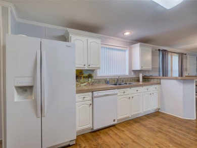 Come and see this turn key ready 3/2 by Palm Harbor home (Vegas on Zellwood Station Country Club in Florida - for sale on GolfHomes.com, golf home, golf lot