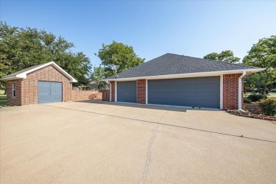 PRIDE OF OWNERSHIP is reflected at every turn in this spacious on Pecan Plantation Country Club in Texas - for sale on GolfHomes.com, golf home, golf lot