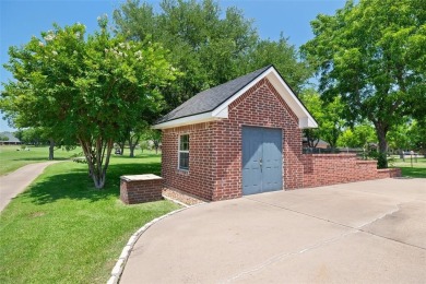 PRIDE OF OWNERSHIP is reflected at every turn in this spacious on Pecan Plantation Country Club in Texas - for sale on GolfHomes.com, golf home, golf lot