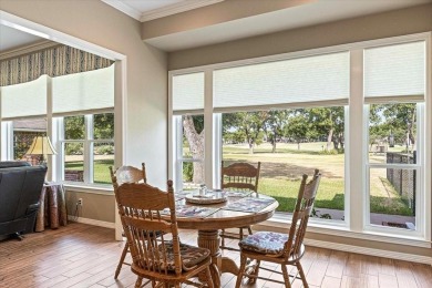 PRIDE OF OWNERSHIP is reflected at every turn in this spacious on Pecan Plantation Country Club in Texas - for sale on GolfHomes.com, golf home, golf lot