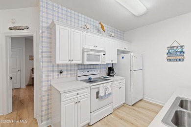 This Champions condo in the vibrant golf community of Sea Trail on Sea Trail Golf Resort in North Carolina - for sale on GolfHomes.com, golf home, golf lot