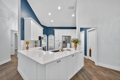 Over $150,000 in upgrades within the past two years make this on Hunters Green Country Club in Florida - for sale on GolfHomes.com, golf home, golf lot