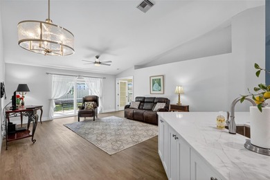 Over $150,000 in upgrades within the past two years make this on Hunters Green Country Club in Florida - for sale on GolfHomes.com, golf home, golf lot