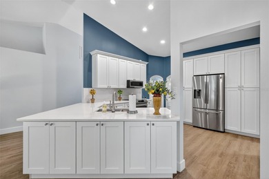 Over $150,000 in upgrades within the past two years make this on Hunters Green Country Club in Florida - for sale on GolfHomes.com, golf home, golf lot