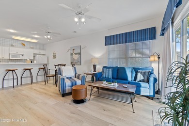 This Champions condo in the vibrant golf community of Sea Trail on Sea Trail Golf Resort in North Carolina - for sale on GolfHomes.com, golf home, golf lot