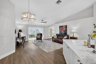 Over $150,000 in upgrades within the past two years make this on Hunters Green Country Club in Florida - for sale on GolfHomes.com, golf home, golf lot