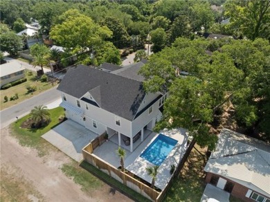 This exquisite, custom built St. Simons Island beach house is on Sea Island Golf Club in Georgia - for sale on GolfHomes.com, golf home, golf lot