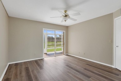 Beautifully updated first-floor unit with golf views! Desirable on The American Golf Club in Florida - for sale on GolfHomes.com, golf home, golf lot