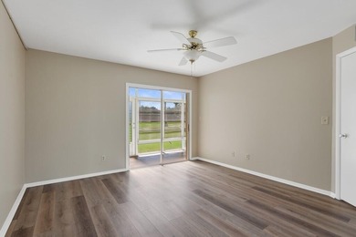 Beautifully updated first-floor unit with golf views! Desirable on The American Golf Club in Florida - for sale on GolfHomes.com, golf home, golf lot