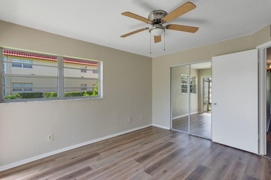 Beautifully updated first-floor unit with golf views! Desirable on The American Golf Club in Florida - for sale on GolfHomes.com, golf home, golf lot