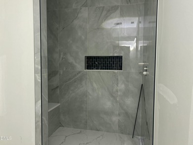 Stunning modern new construction in the gated lake community of on River Golf and Country Club at Lake Royale in North Carolina - for sale on GolfHomes.com, golf home, golf lot