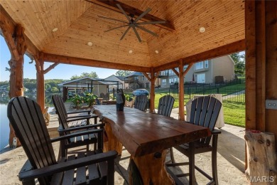 Stunning Waterfront Atrium Ranch with 4 bedrooms, 3 full baths on Raintree Country Club in Missouri - for sale on GolfHomes.com, golf home, golf lot