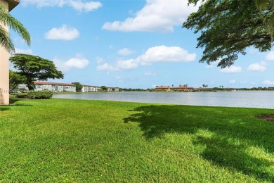 WOW! ** CENTER LAKE CORNER UNIT **( 1,533 sq ft,  shows larger on Flamingo Lakes Country Club in Florida - for sale on GolfHomes.com, golf home, golf lot