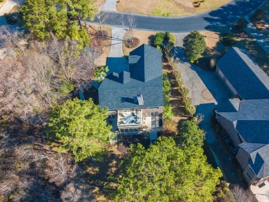 This lovely, traditional brick home located on the Waccamaw on Heritage Club in South Carolina - for sale on GolfHomes.com, golf home, golf lot