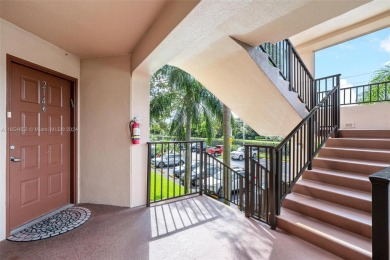 WOW! ** CENTER LAKE CORNER UNIT **( 1,533 sq ft,  shows larger on Flamingo Lakes Country Club in Florida - for sale on GolfHomes.com, golf home, golf lot