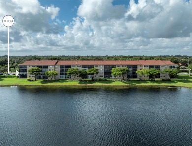 WOW! ** CENTER LAKE CORNER UNIT **( 1,533 sq ft,  shows larger on Flamingo Lakes Country Club in Florida - for sale on GolfHomes.com, golf home, golf lot