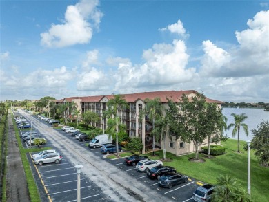 WOW! ** CENTER LAKE CORNER UNIT **( 1,533 sq ft,  shows larger on Flamingo Lakes Country Club in Florida - for sale on GolfHomes.com, golf home, golf lot