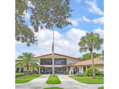 WOW! ** CENTER LAKE CORNER UNIT **( 1,533 sq ft,  shows larger on Flamingo Lakes Country Club in Florida - for sale on GolfHomes.com, golf home, golf lot