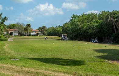 Beautifully updated first-floor unit with golf views! Desirable on The American Golf Club in Florida - for sale on GolfHomes.com, golf home, golf lot