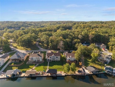 Stunning Waterfront Atrium Ranch with 4 bedrooms, 3 full baths on Raintree Country Club in Missouri - for sale on GolfHomes.com, golf home, golf lot