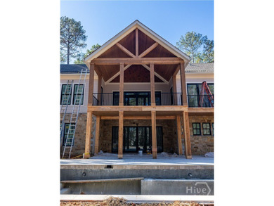 Completed March 2026 and ready for the lake season, this new on Reynolds Lake Oconee - The Oconee in Georgia - for sale on GolfHomes.com, golf home, golf lot