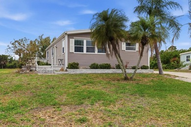 Welcome to this charming double-wide manufactured home located on Lemon Bay Golf Club in Florida - for sale on GolfHomes.com, golf home, golf lot