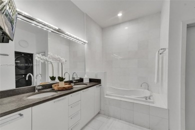 Experience  Miami Beach luxury living in this one-of-a-kind on Miami Beach Golf Club in Florida - for sale on GolfHomes.com, golf home, golf lot