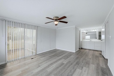 Welcome to this charming double-wide manufactured home located on Lemon Bay Golf Club in Florida - for sale on GolfHomes.com, golf home, golf lot